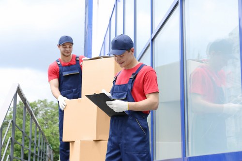 Movers loading boxes for a local Teddington home move