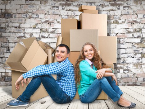 Professional movers loading a van for a Teddington house move
