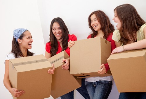 Careful loading of furniture into a removals van for a local house move