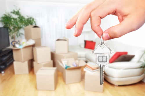 Loading furniture into a removal van in Teddington