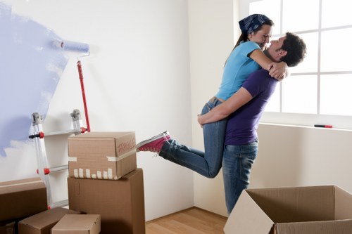 Worker wearing PPE during furniture loading and unloading