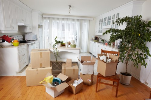 Furniture and boxes being transported by a local moving service