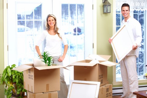 Removal van outside a local Teddington home with moving boxes