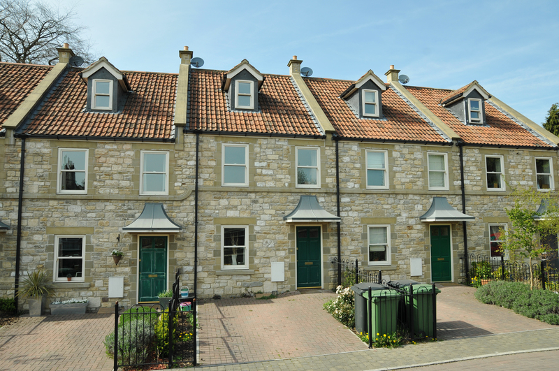 Careful unpacking of household items into a new Teddington property